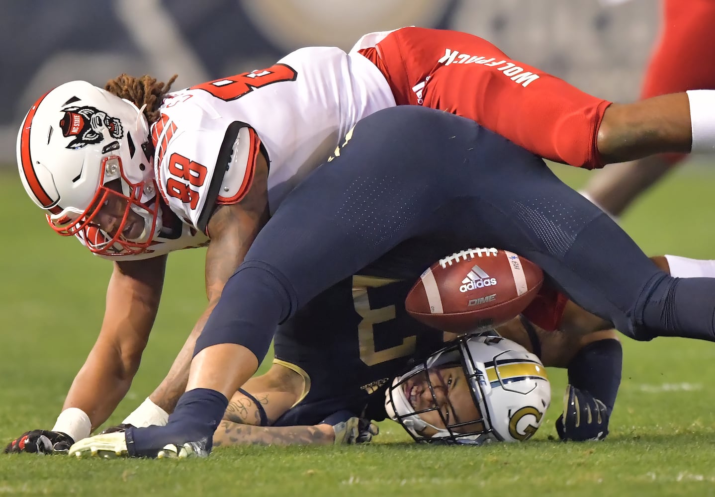 Photos: Jackets host Wolfpack in Thursday night game