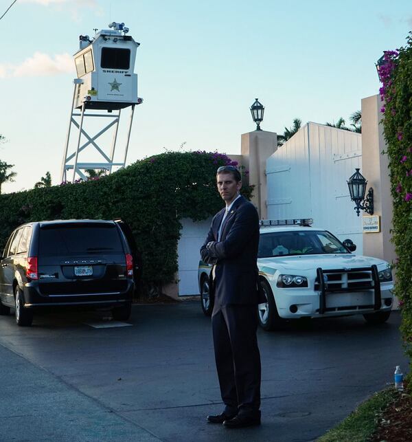 Members of the Palm Beach County Sheriff’s Office and other security members watch the South entrance on A1A during President-elect Donald Trump’s stay at Mar-a-Lago in Palm Beach on November 24, 2016. (Richard Graulich / The Palm Beach Post)