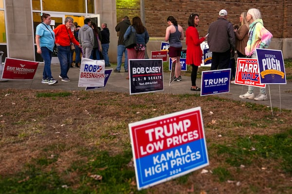 FILE - Voters wait in line to cast their ballots at the Kingston Armory in Wilkes-Barre, Pa, Nov. 5, 2024. (AP Photo/Matt Rourke, File)