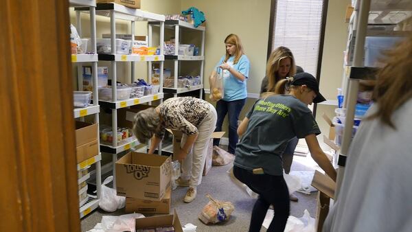 The packing room at the Gwinnett office of Nothing but the Truth is filled with shelves of food that will go into sacks for children in schools in Gwinnett, Clayton and Barrow counties. CONTRIBUTED BY NOTHING BUT THE TRUTH