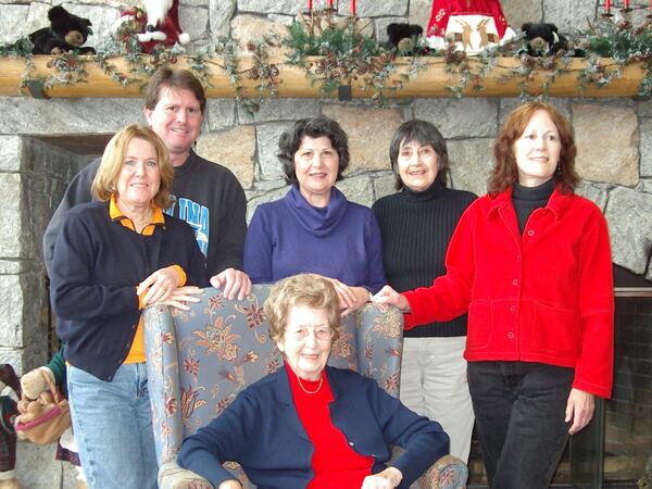 Dora Sowell (seated) with her five children from left to right: Denise Johnson, Jud Sowell, Lucy Kirby, Caroline Mathis and Phyllis Irby. Mostly staying in her room now, Sowell continues to read the newspaper every day, and knit. And she looks forward to the day when she sees her family in person.CONTRIBUTED