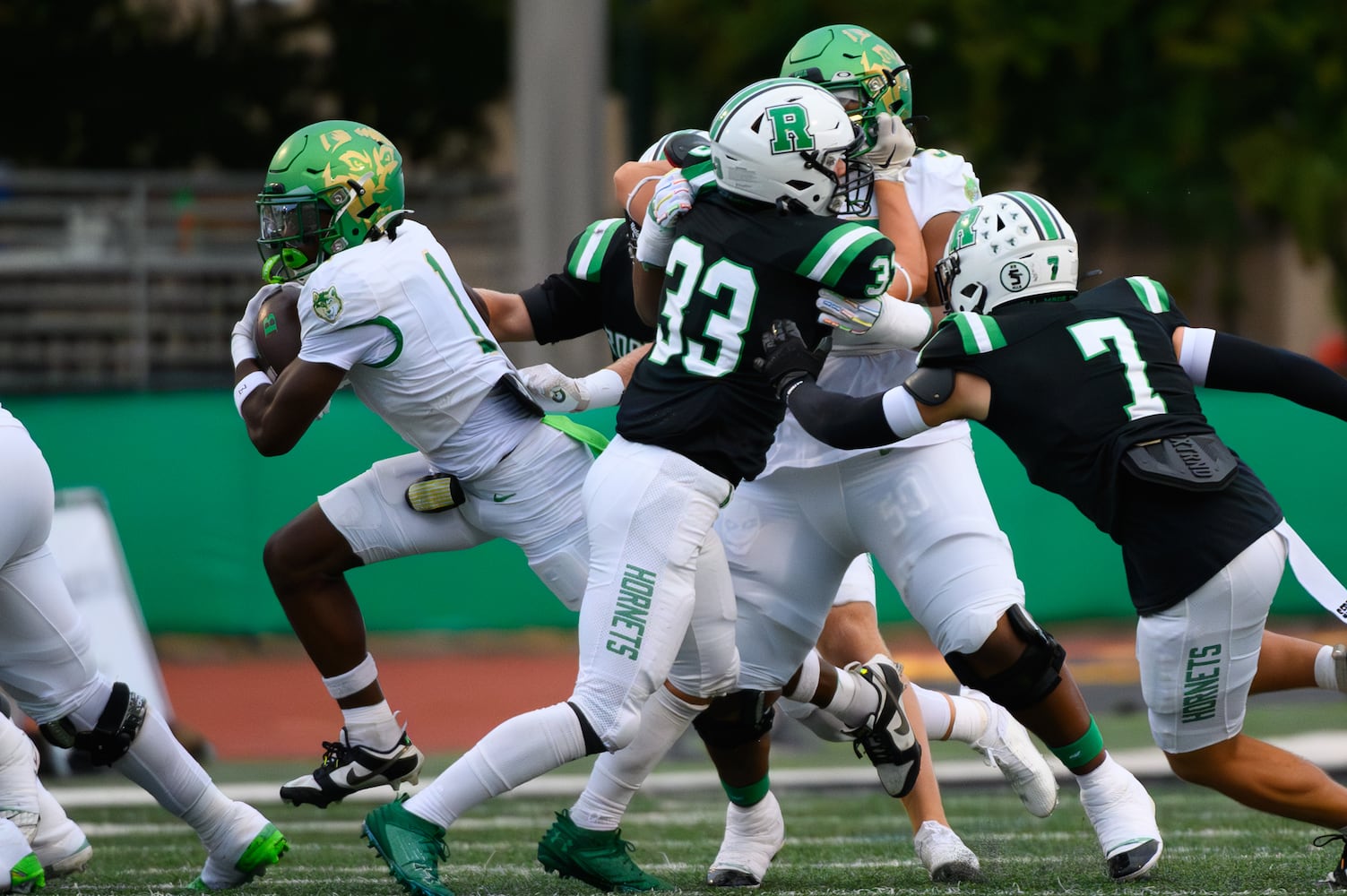 Buford’s Ethan Ervin makes his way through the Roswell defense. (Jamie Spaar for the Atlanta Journal Constitution)