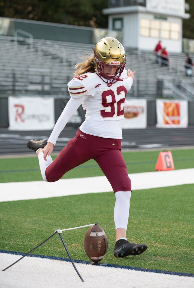 Caitlyn Soroka, kicker for Brookwood, warms up before the game. (Jamie Spaar for the Atlanta Journal Constitution)