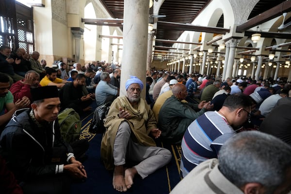 Muslims pray during Friday prayers at Al-Azhar mosque, the Sunni Muslim world's premier Islamic institution, during Ramadan, in Cairo, Egypt, Friday, April 7, 2023. (AP Photo/Amr Nabil)