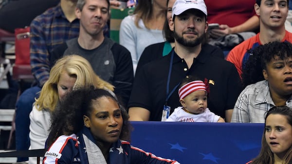 ASHEVILLE, NC - FEBRUARY 10: Serena Williams of Team USA, bottom left, along with her husband Alexis Ohanian and their daughter Alexis Olympia, center, watch the action during the first round of the 2018 Fed Cup at US Cellular Center on February 10, 2018 in Asheville, North Carolina. (Photo by Richard Shiro/Getty Images)