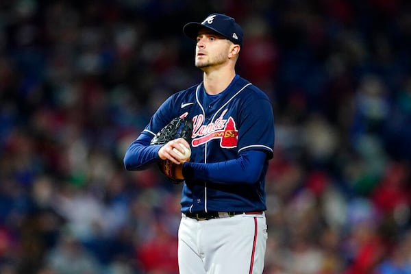 Atlanta Braves pitcher Jake Odorizzi reacts after walking Philadelphia Phillies' Kyle Schwarber during the fourth inning of a baseball game, Friday, Sept. 23, 2022, in Philadelphia. (AP Photo/Matt Slocum)