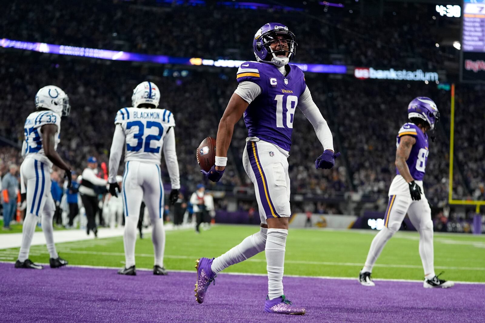 Minnesota Vikings wide receiver Justin Jefferson (18) celebrates after catching a pass for a first down during the second half of an NFL football game against the Indianapolis Colts, Sunday, Nov. 3, 2024, in Minneapolis. (AP Photo/Abbie Parr)