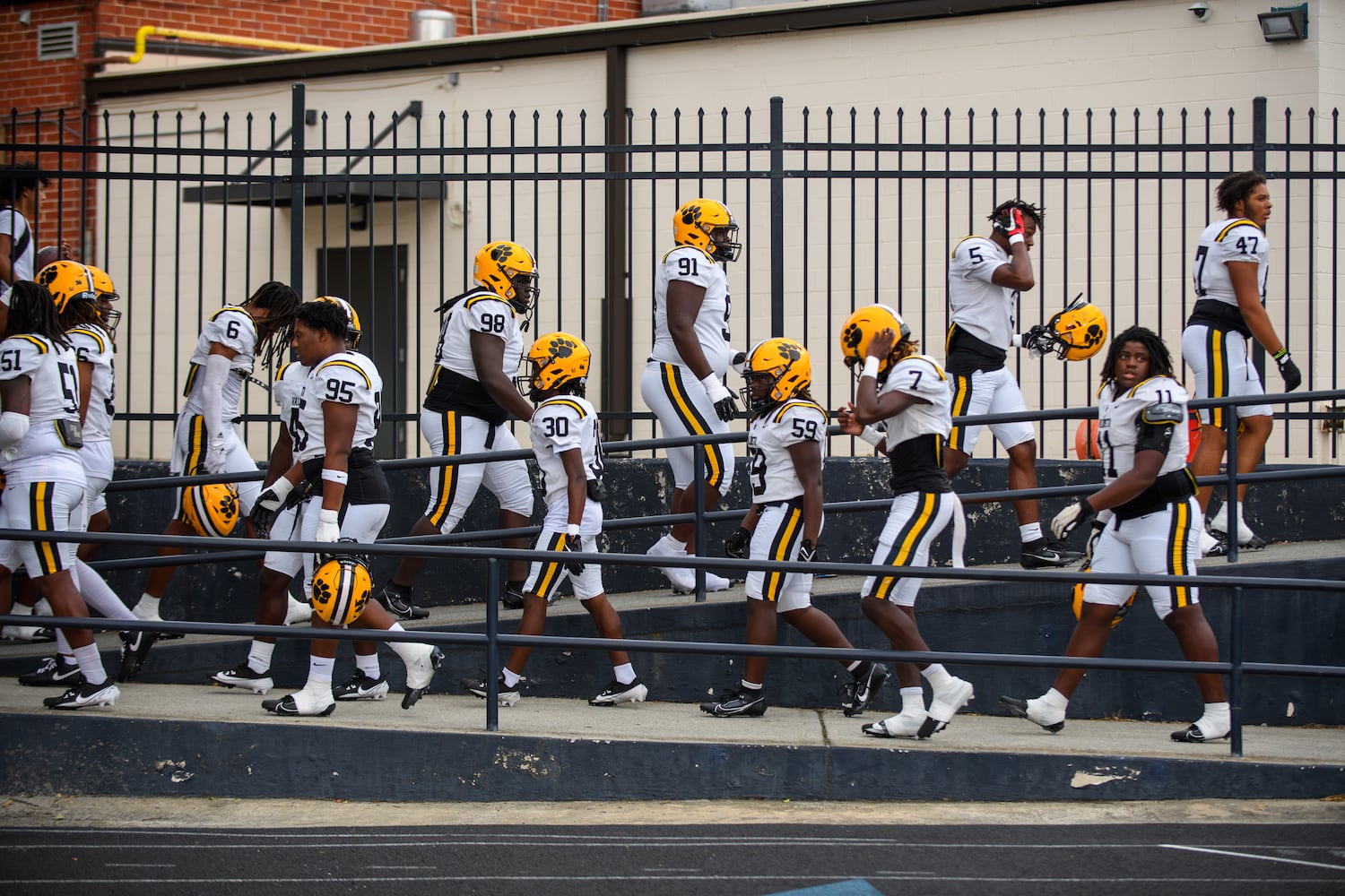 The Valdosta Wildcats take to the field. (Jamie Spaar for the Atlanta Journal Constitution)