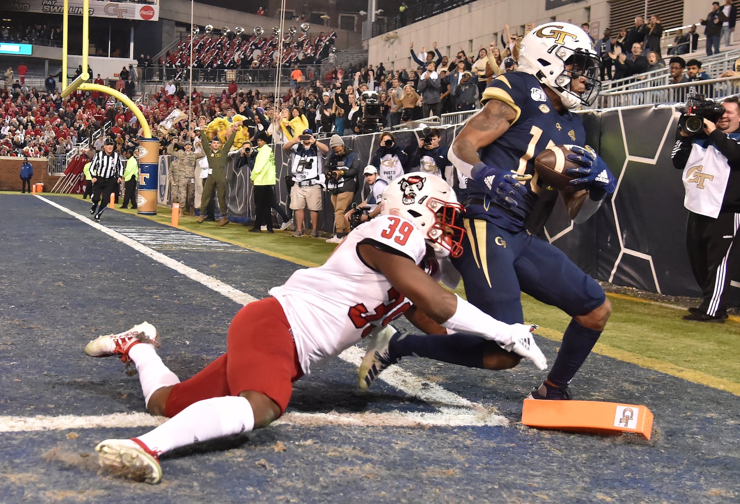 Photos: Jackets host Wolfpack in Thursday night game