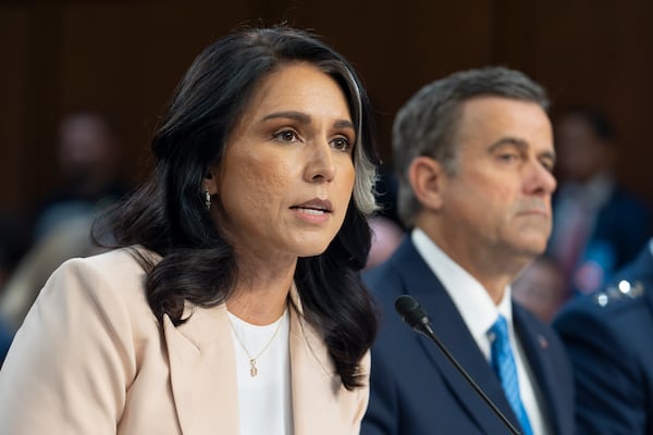 Director of National Intelligence Tulsi Gabbard, joined at right by CIA Director John Ratcliffe, answer questions as the Senate Intelligence Committee holds its worldwide threats hearing, on Capitol Hill in Washington, Tuesday, March 25, 2025. (AP Photo/J. Scott Applewhite)