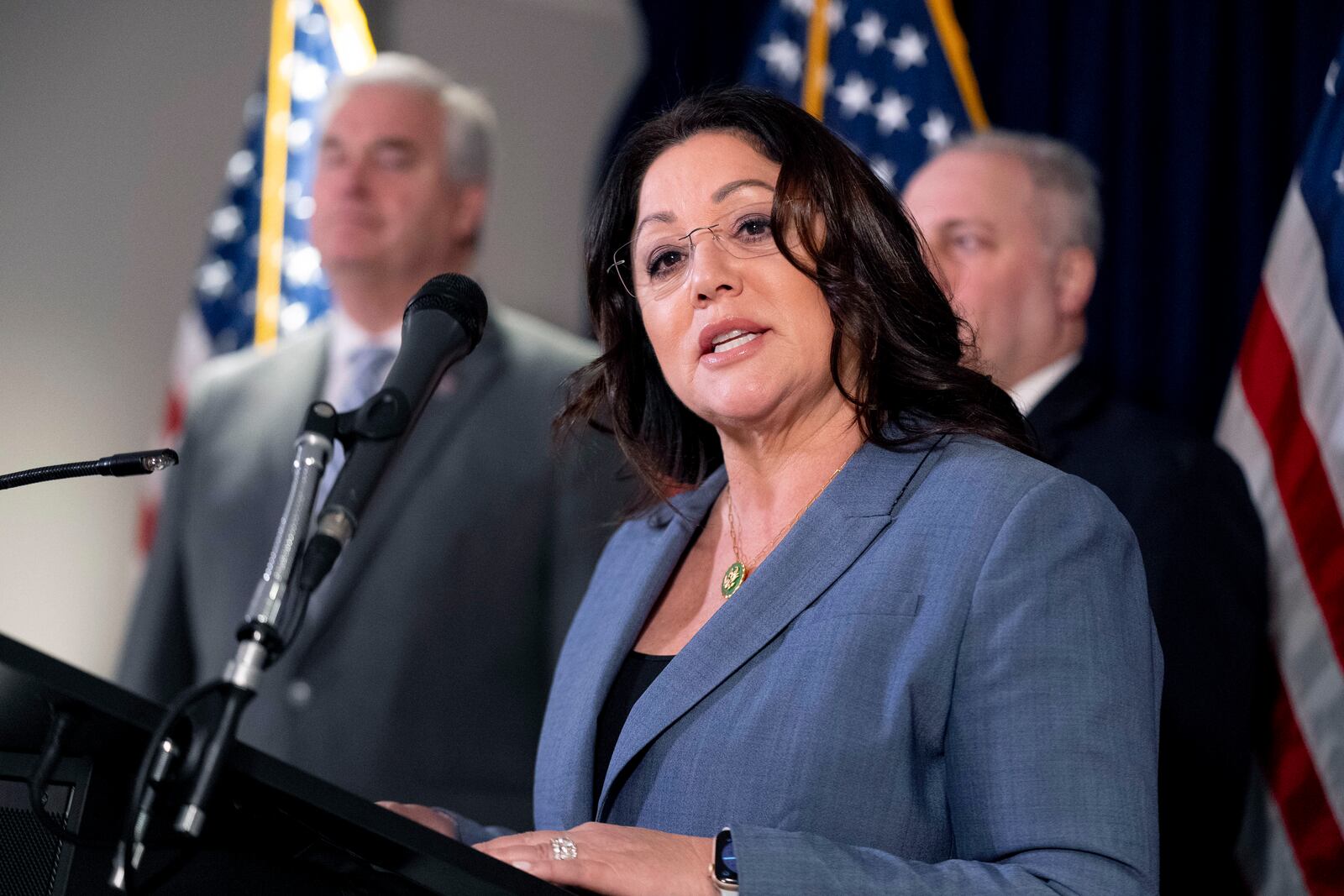 FILE - Rep. Lori Chavez-DeRemer, R-Ore., accompanied by Majority Whip Rep. Tom Emmer, R-Minn., left, and House Majority Leader Rep. Steve Scalise, R-La., right, speaks at a news conference on Capitol Hill in Washington, Wednesday, Jan. 25, 2023. (AP Photo/Andrew Harnik, File)