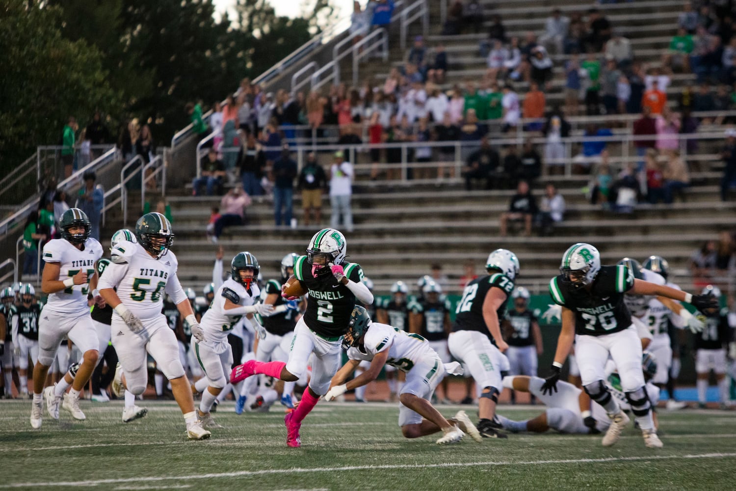 Ethan Nation, running back for Roswell, runs the ball during the Blessed Trinity vs. Roswell high school football game on Thursday, September 29, 2022, at Roswell high school in Roswell, Georgia. Roswell defeated Blessed Trinity 41-10. CHRISTINA MATACOTTA FOR THE ATLANTA JOURNAL-CONSTITUTION.