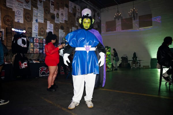 Riley Edwards is dressed in cosplay as 'Mojo Jojo' from the Power Puff Girls at Cxmmunity Media's partnership with local event brand Trap Sushi  at Monday Night Garage in Atlanta Georgia, on Friday, Feb. 23, 2024. (Olivia Bowdoin for the AJC). 