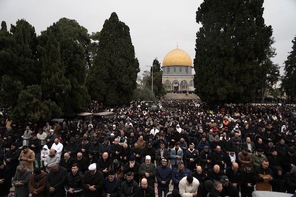 Worshippers at the Al-Aqsa Mosque compound take part in the first Friday Prayers of the Muslim holy month of Ramadan in the Old City of Jerusalem, Friday, March 7, 2025. (AP Photo/Mahmoud Illean)