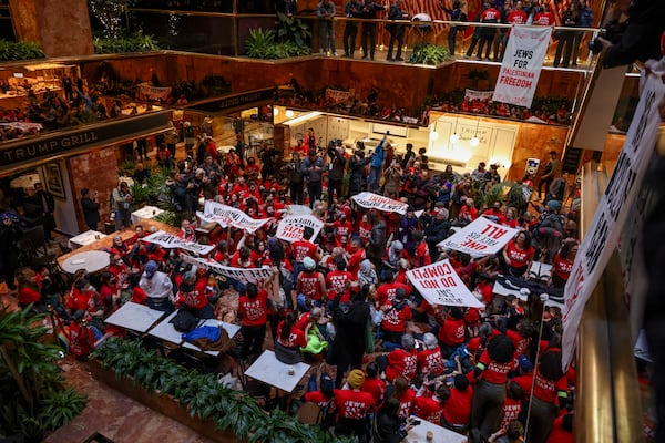 Demonstrators from the group, Jewish Voice for Peace, protest inside Trump Tower in support of Columbia graduate student Mahmoud Khalil, Thursday, March 13, 2025, in New York. (AP Photo/Yuki Iwamura)