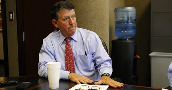 Greg McGarity in his office. (Josh L. Jones/AJC photo)