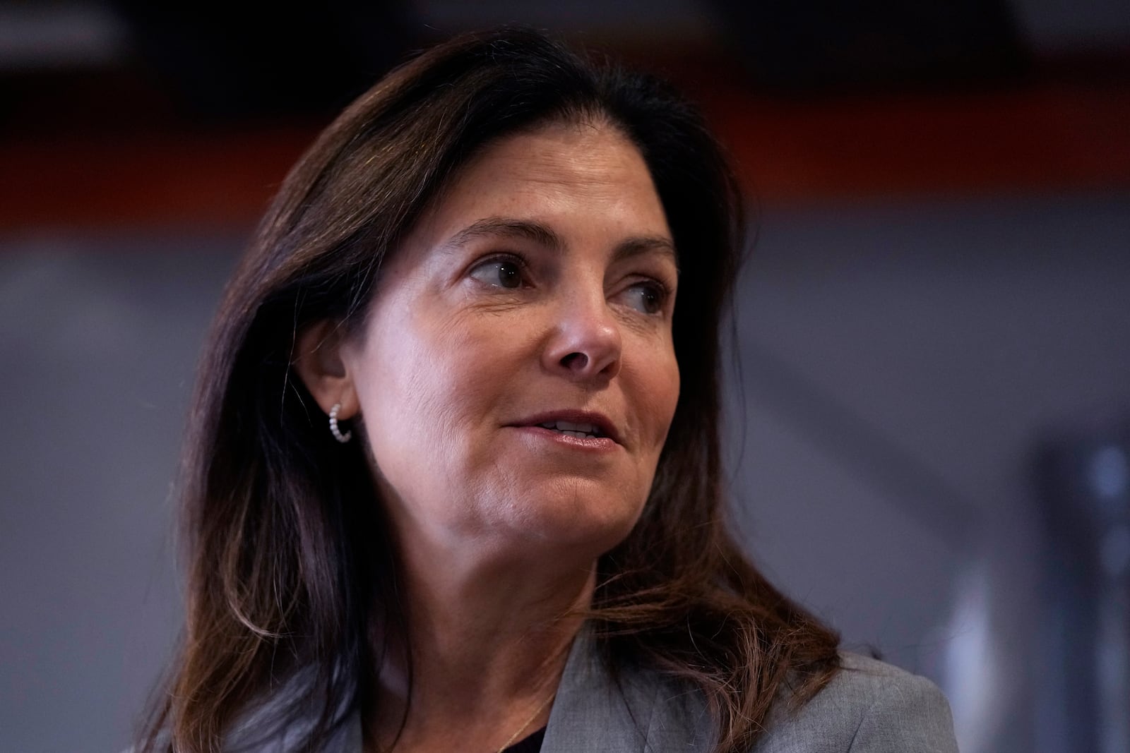 Republican gubernatorial candidate Kelly Ayotte, who faces Democrat Joyce Craig in the November 2024 election, answers a question during a visit to a local concrete coating business, Wednesday, Oct. 16, 2024, in Manchester, N.H. (AP Photo/Charles Krupa)