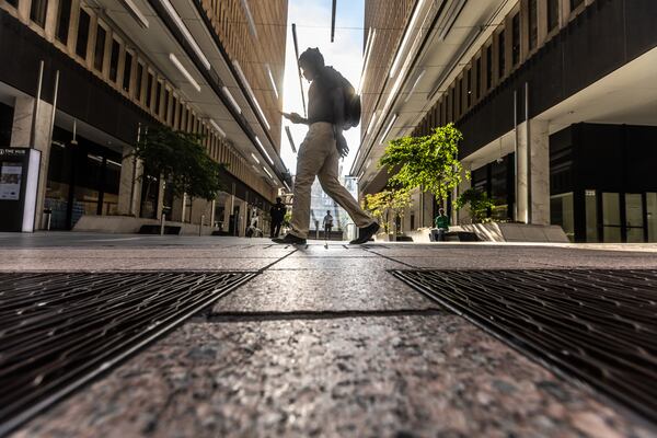 Peachtree Center in downtown Atlanta returns to business the morning after a shooting on June 11. (John Spink/AJC)