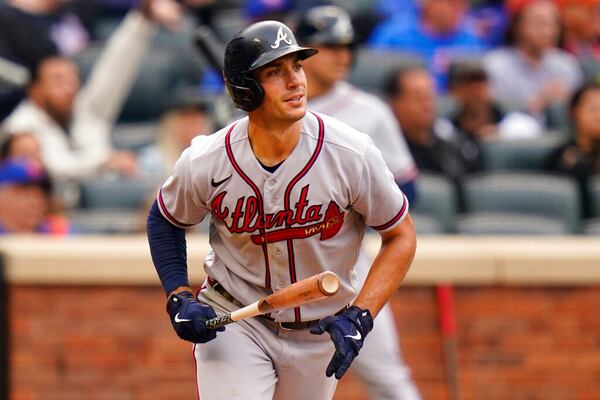 Atlanta Braves' Matt Olson watches his three-run home run during the fifth inning in the first baseball game of a doubleheader against the New York Mets, Tuesday, May 3, 2022, in New York. (AP Photo/Frank Franklin II)