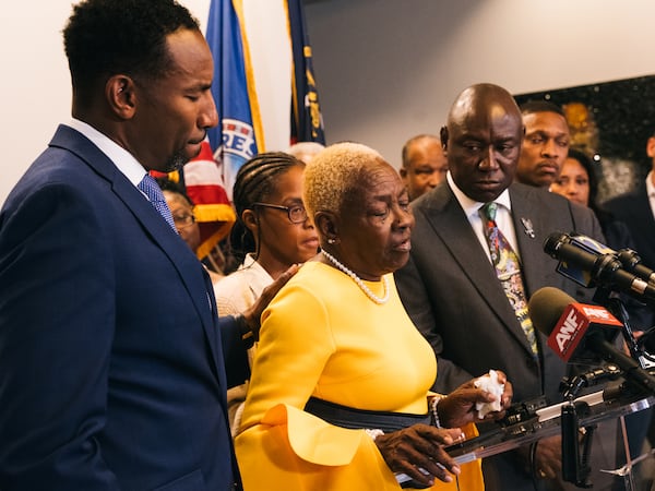 Ms. Peaches, a resident of Millennia's Forest Cove apartments for more than 30 years, cries as she recounts the rats, mold, and dangerous living conditions she and her friends and family have been forced to put up with at the Atlanta City Hall on Friday, Oct. 6, 2023. She will be the representative plaintiff in an incoming lawsuit against Millennia from the City of Atlanta. (Olivia Bowdoin for the AJC).