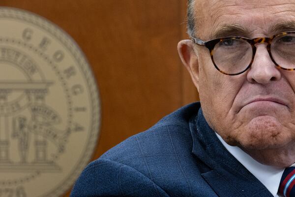 Rudi Giuliani listens to testimony during a subcommittee of the Georgia Senate judiciary committee meeting at the state Capitol on Dec. 3, 2020. Giuliani and others alleged serious voting problems in Georgia and asked that the State Legislature choose Georgia's electors. (Ben Gray for The Atlanta Journal-Constitution)