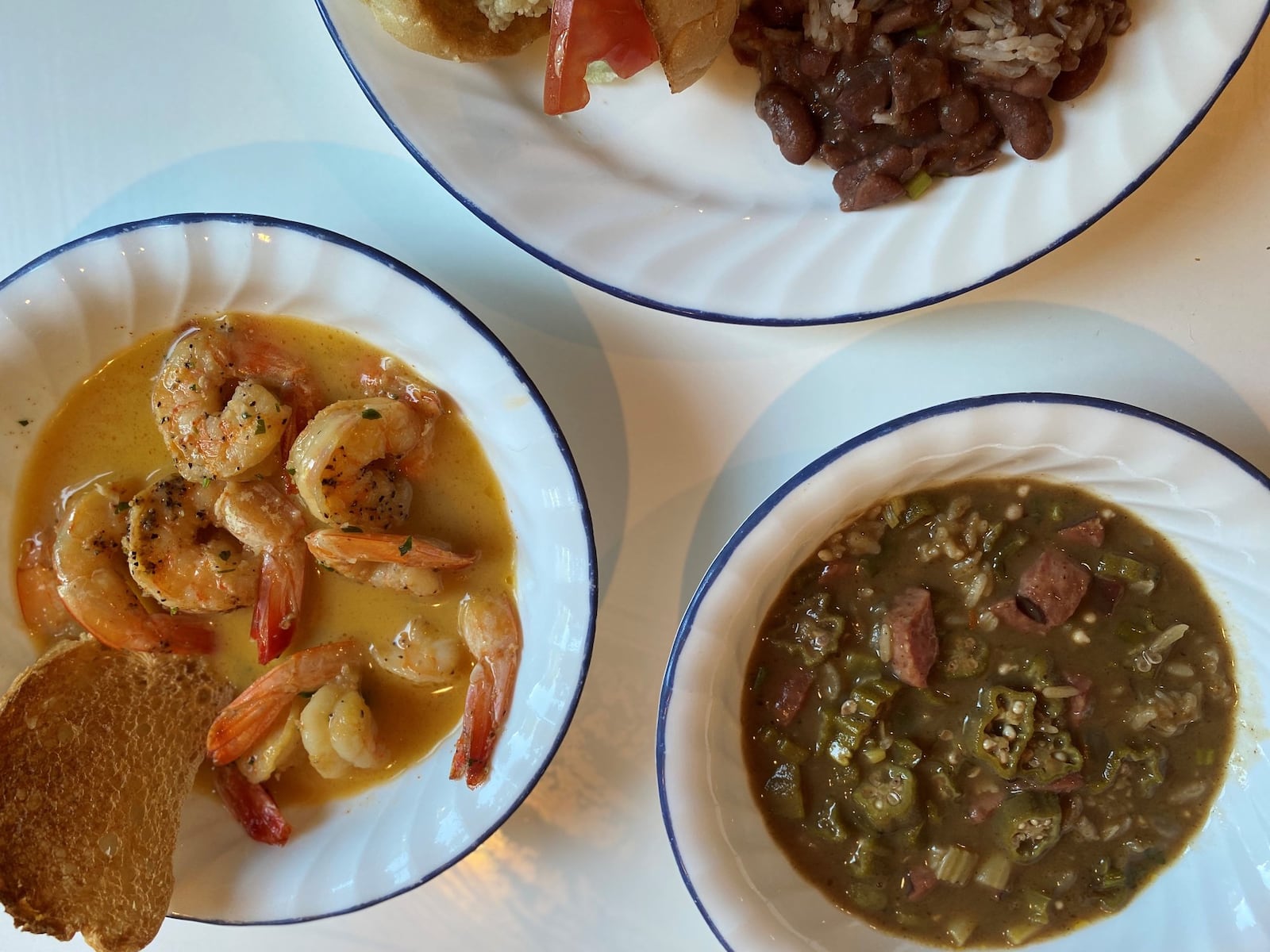 This order of plancha shrimp (left) and andouille sausage gumbo is from Lagarde in Chamblee. CONTRIBUTED BY BOB TOWNSEND