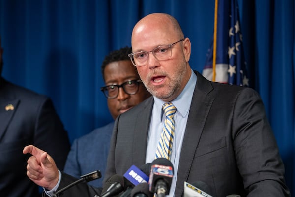 Towaliga Judicial Circuit District Attorney Jonathan Adams joins other DAs in the area to file a lawsuit against the state of Georgia and commissioners in regards to Senate Bill 92 in Decatur on Wednesday, August 2, 2023. (Katelyn Myrick/katelyn.myrick@ajc.com)