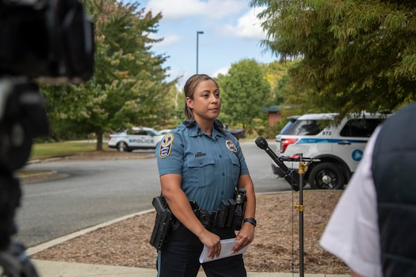 Gwinnett County Officer Hideshi Valle speaks to reporters during a news conference Tuesday.