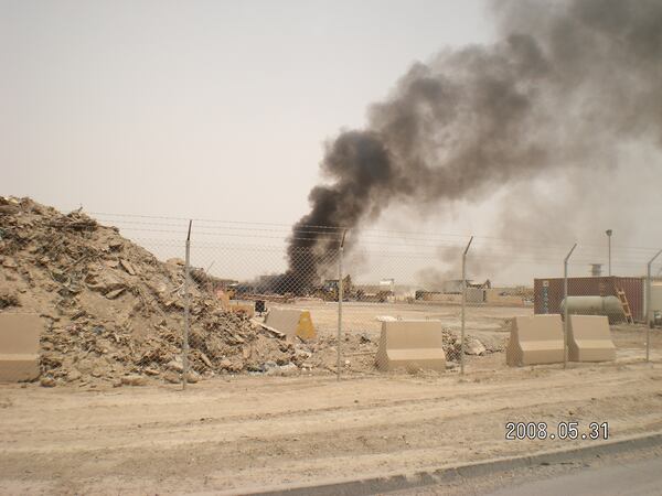 Le Roy Torres took this photo of the burn pit at Joint Base Balad in Iraq in 2008. He remembers the air on the base smelled like burning rubber and that it felt as though he were “breathing in charcoal." (Courtesy)