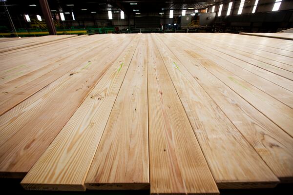 Georgia yellow pine boards roll off a production line at Canfor's Washington, Georgia, plant. Courtesy of Canfor