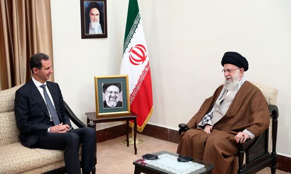 FILE - In this photo released by the official website of the office of the Iranian supreme leader, Supreme Leader Ayatollah Ali Khamenei, right, speaks with Syrian President Bashar Assad in a meeting in Tehran, Iran, Thursday, May 30, 2024. (Office of the Iranian Supreme Leader via AP, File)