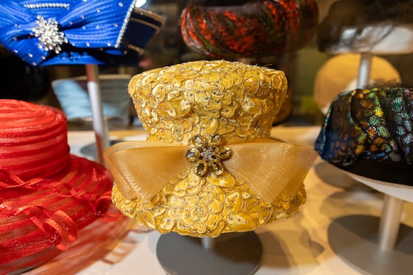 A hat (center) that belonged to Christine King Farris, sister of Martin Luther King Jr., appears in the “The Hats of the King Family Women” exhibit at the Atlanta History Center in Atlanta on Monday, February 10, 2025. (Arvin Temkar / AJC)