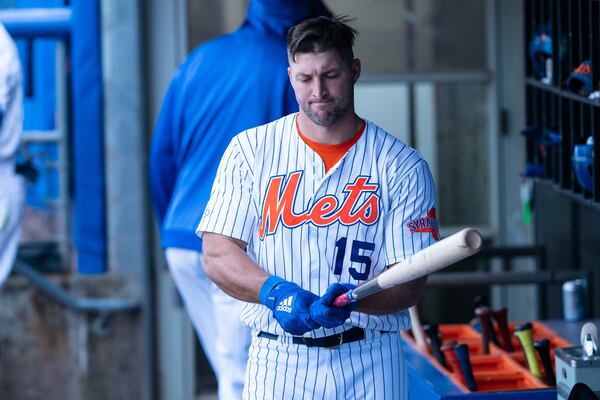 Syracuse Mets left fielder Tim Tebow prepares for an at-bat during the seventh inning against the Buffalo Bisons at NBT Bank Stadium.