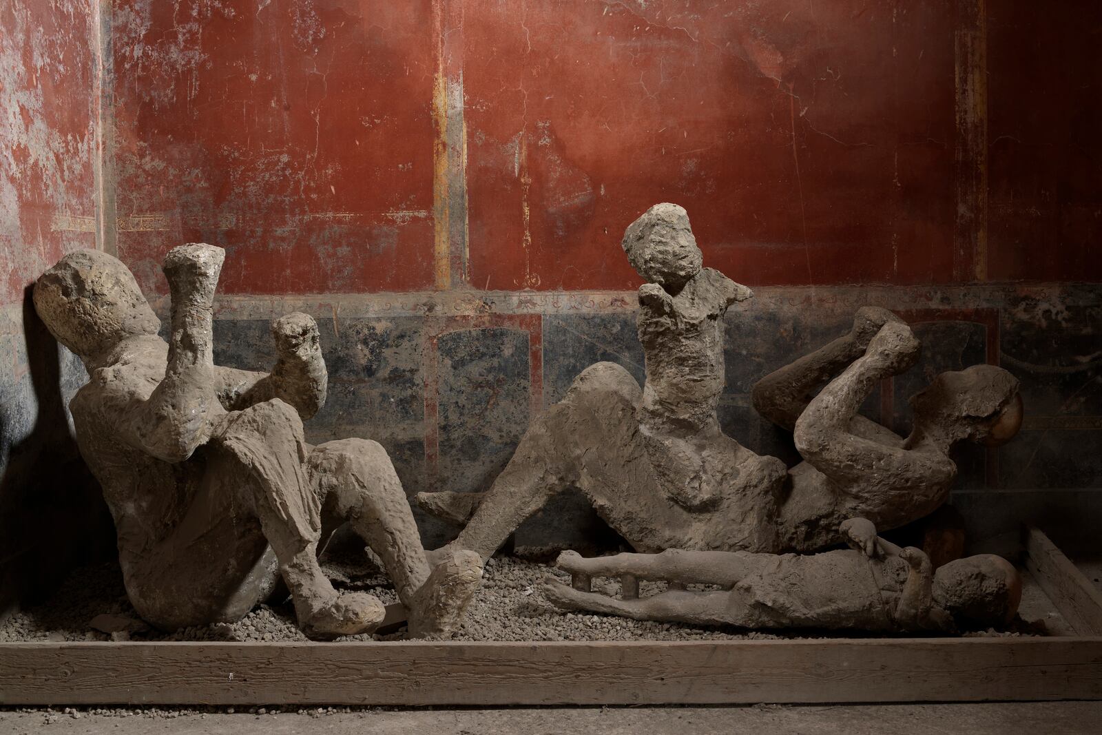 This image provided by the Archeological Park of Pompeii shows a group of casts, numbers 50, 51 and 52, made in 1974 from the Casa del Bracciale d'Oro in Pompeii. (Courtesy of MIC, Archaeological Park of Pompeii via AP)