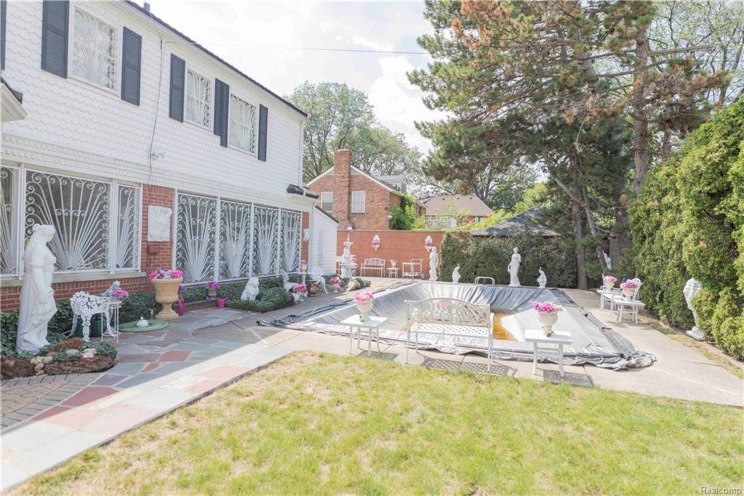 Photos: Inside $550K Lion Gate Estate, whimsical home with carpeted ceilings, vintage cars