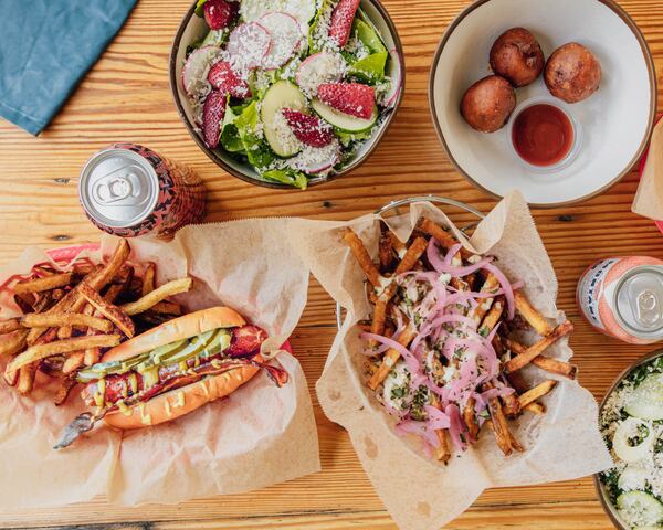 The spicy cheddarwurst (bottom left) is among the additions to the summer Farm Burger menu. Courtesy of Farm Burger