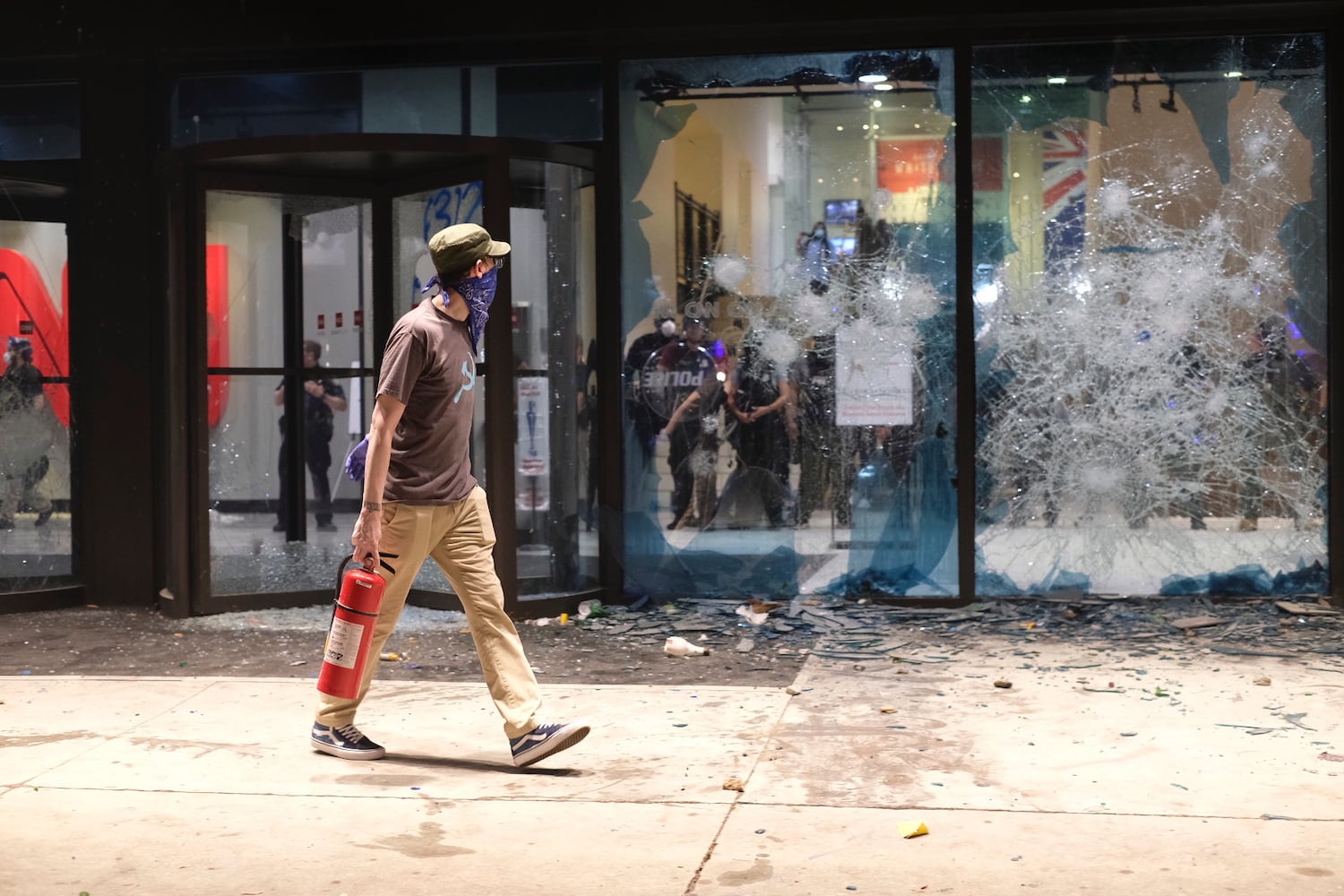 PHOTOS: Atlanta rally against police violence draws hundreds, turns violent