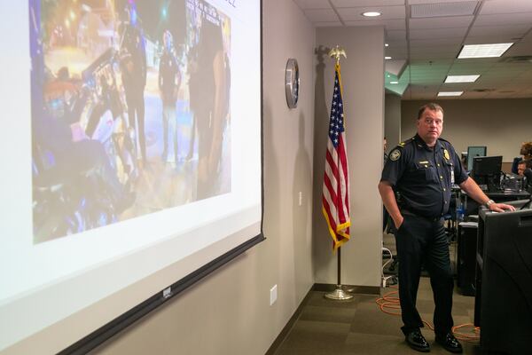 Maj. Michael O'Connor said surveillance footage helped police piece together a midday shootout last month outside a northwest Atlanta grocery store. 
(Steve Schaefer / steve.schaefer@ajc.com)