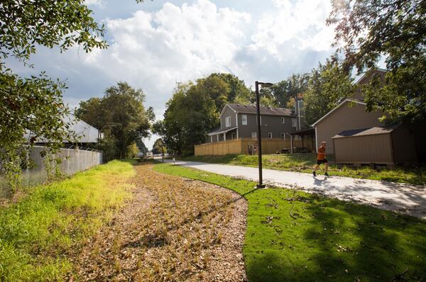 The Eastside Trail of the Beltline at Wylie Street links Kirkwood Ave and Krog Tunnel to the Beltline.   The path now has lighting, security cameras and infrastructure for future development of the rail system.  (Jenni Girtman / Atlanta Event Photography)