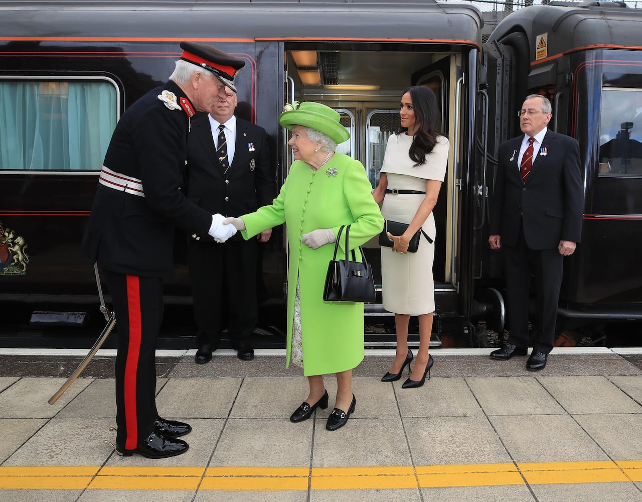 Photos: Meghan Markle stuns at first solo outing with Queen Elizabeth