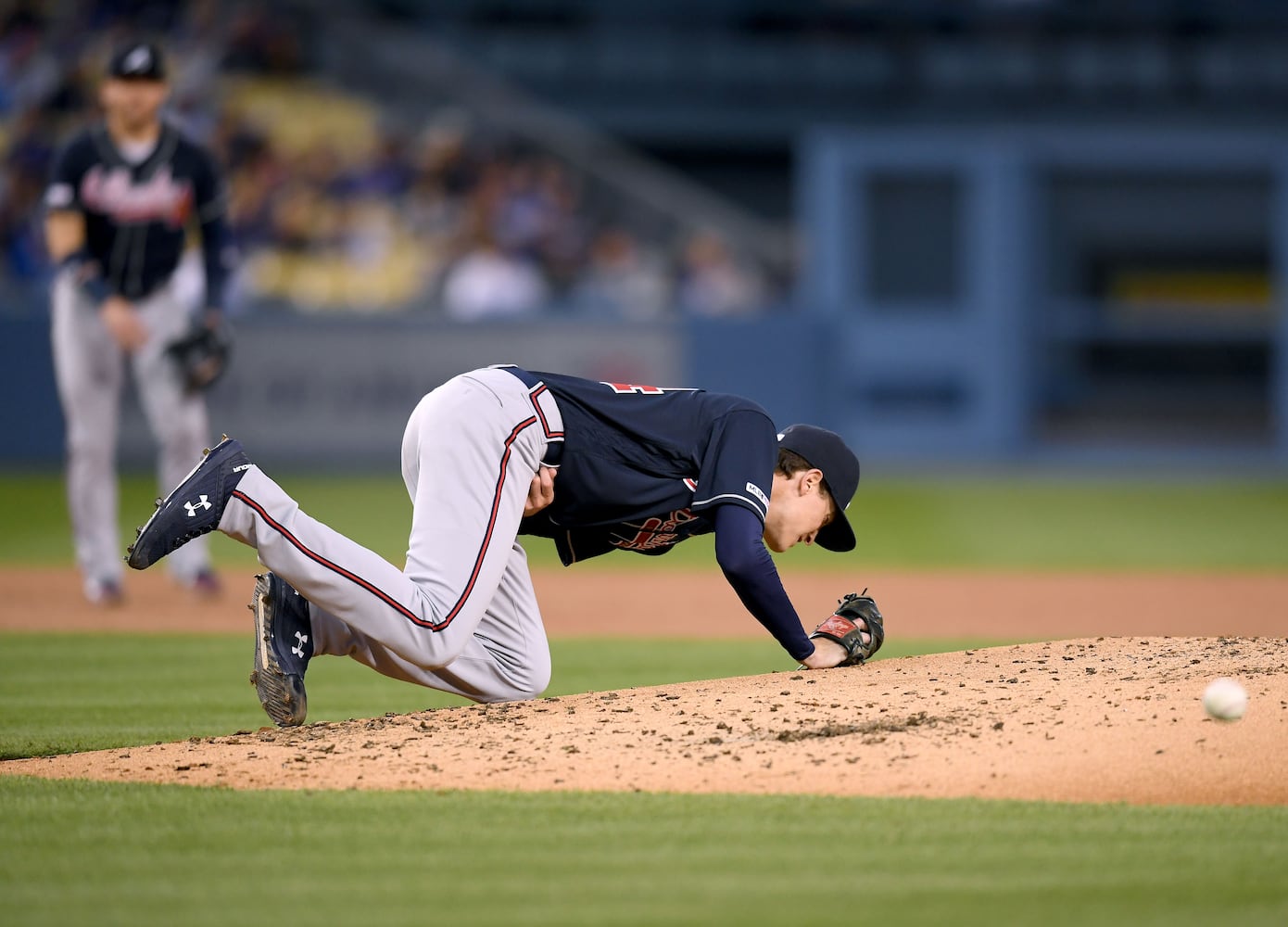 Photos: Braves, Fried hit hard - literally - by Dodgers