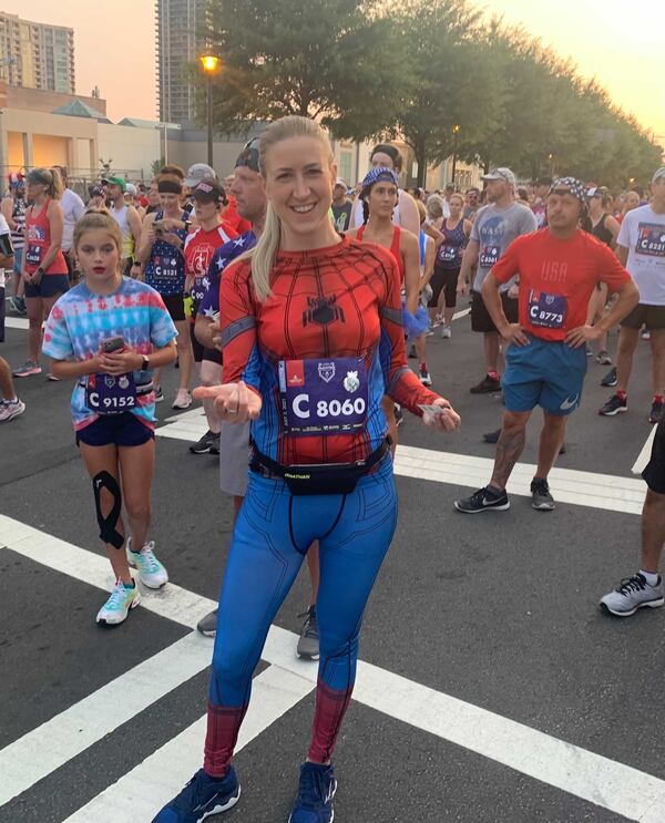 Taylor Perkins, 30, of Brookhaven wore a Spider-Man costume to the race: “It’s just so great to see everybody really coming together and just getting back to Atlanta traditions.” (Photo: Jeremy Redmon/AJC)