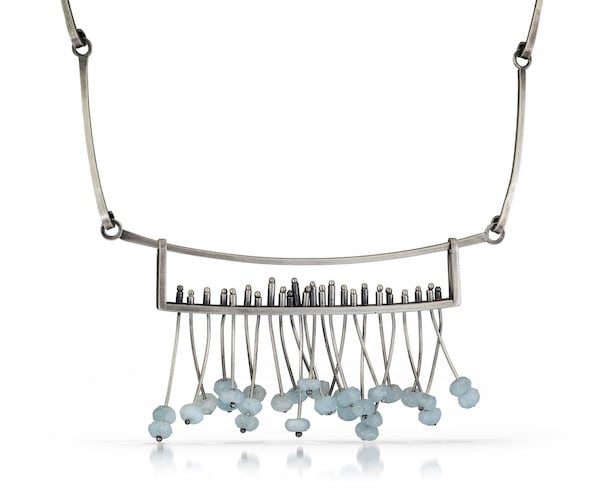 Aqua Fringe, a necklace made of silver, aquamarine and patina by Theresa St. Romain. Contributed by Cole Rodger