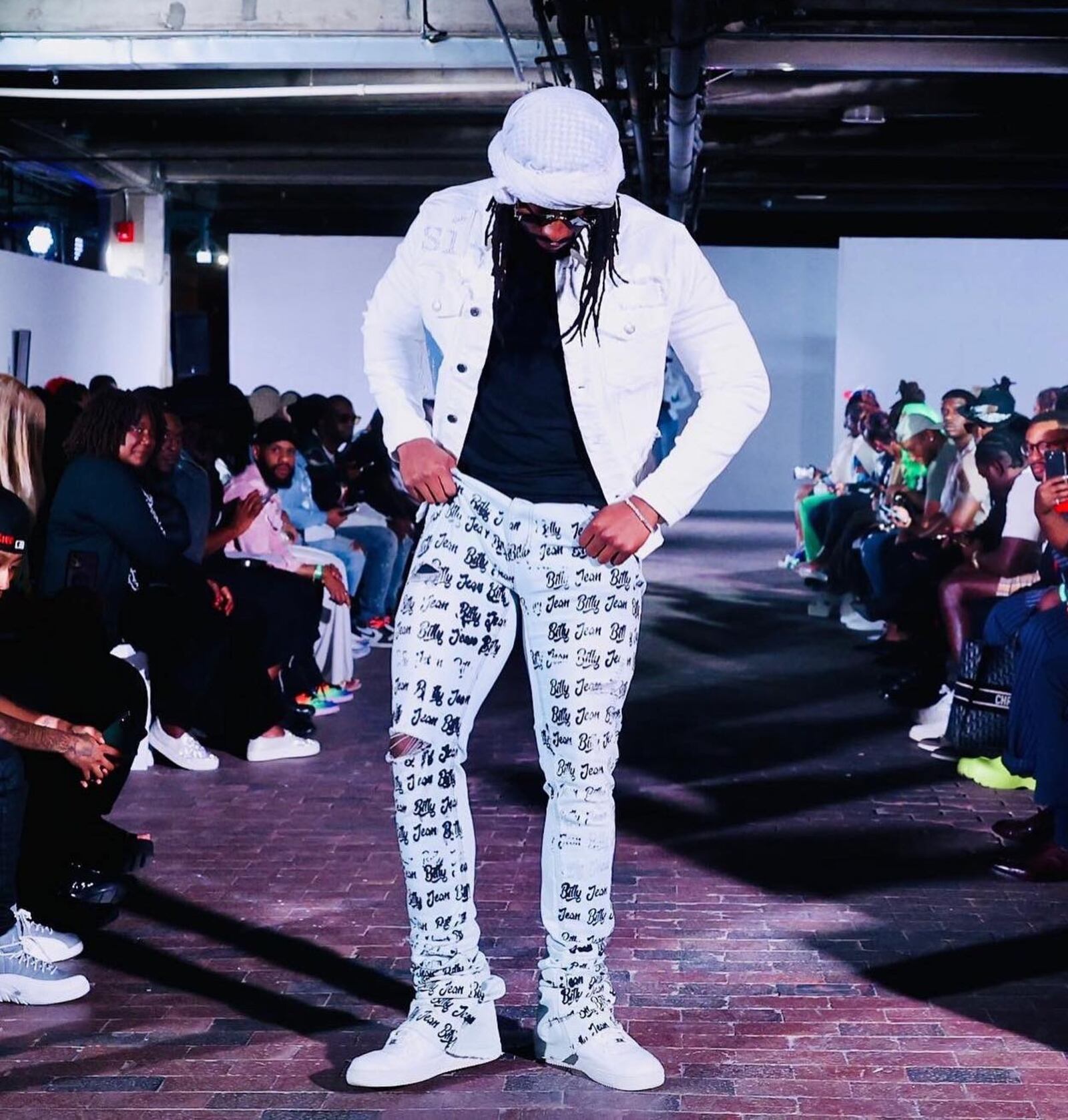 A model poses on the runway at 2022 Atlanta Fashion Week. Photo: Courtesy of ATLFW / Prince Williams / ATLpics.net