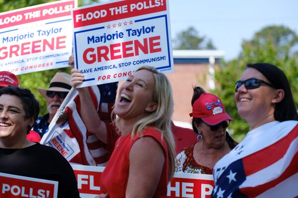 U.S. Rep. Marjorie Taylor Greene campaigns in Rome on Monday, May 2, 2022.  Greene, a far-right representative and conspiracy-peddling provocateur who has endorsed calls to assassinate prominent Democrats, is expected to coast to a primary victory on Tuesday, May 24 that will all but guarantee her another term in Congress. (Arvin Temkar / arvin.temkar@ajc.com)