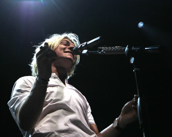 July 10, 2015 Atlanta: Ross Lynch smiles as he sings. R5, a five-piece band made up of four siblings and a family friend, performed at Verizon Wireless Amphitheater in Alpharetta on Friday night. Ross Lynch, vocalist, guitarist and frontman, stars on the Disney Channel show Austin & Ally. Jacob Whitesides and Ryland opened for the headliner. HAYDEN FIELD / HAYDEN.FIELD@AJC.COM