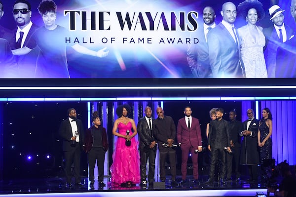 Craig Wayans, from left, Chaunté Wayans, Kim Wayans, Marlon Wayans, Damon Wayans Sr., Damon Wayans Jr., and Damien Dante Wayans are given the NAACP Hall of Fame award during the 56th NAACP Image Awards on Saturday, Feb. 22, 2025, in Pasadena, Calif. (Photo by Richard Shotwell/Invision/AP)