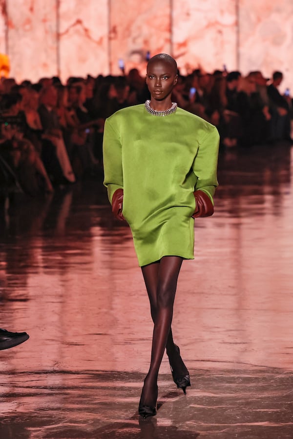 A model wears a creation as part of the Saint Laurent Fall/Winter 2025-2026 Womenswear collection presented Tuesday, March 11, 2025. in Paris. (AP Photo/Thomas Padilla)