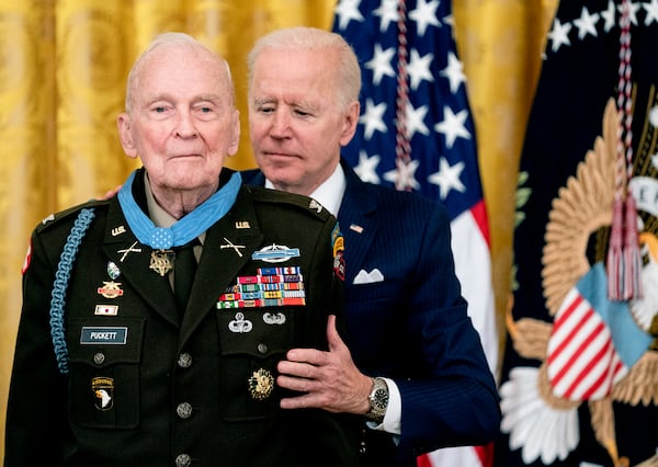 President Joe Biden presented the Medal of Honor to retired U.S. Army colonel Ralph Puckett, Jr., at the White House in 2021. Puckett died Monday at age 97.