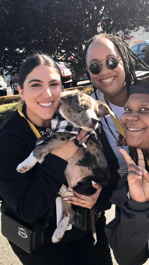 Puppy Bowl 2023 participant Bleu with Beunca Gainor (right), Dr. Makeba Clarke (Bleu's veterinarian- center), and Sheila Donya Kouhkanl (left). CONTRIBUTED